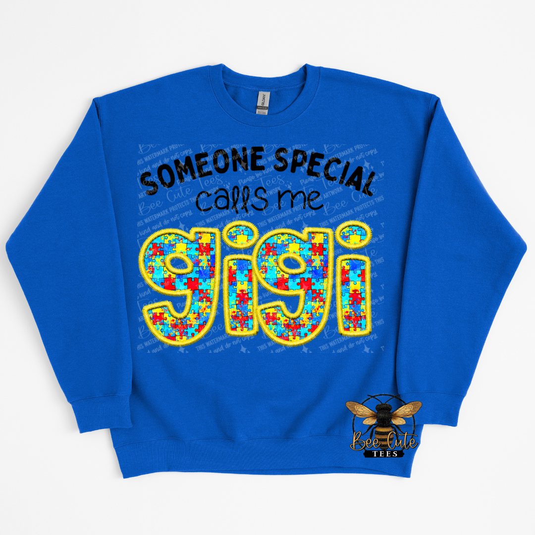 Blue sweatshirt with colorful text and a bee logo in the corner