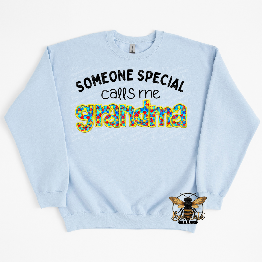 Light blue sweatshirt with colorful text design on a white background