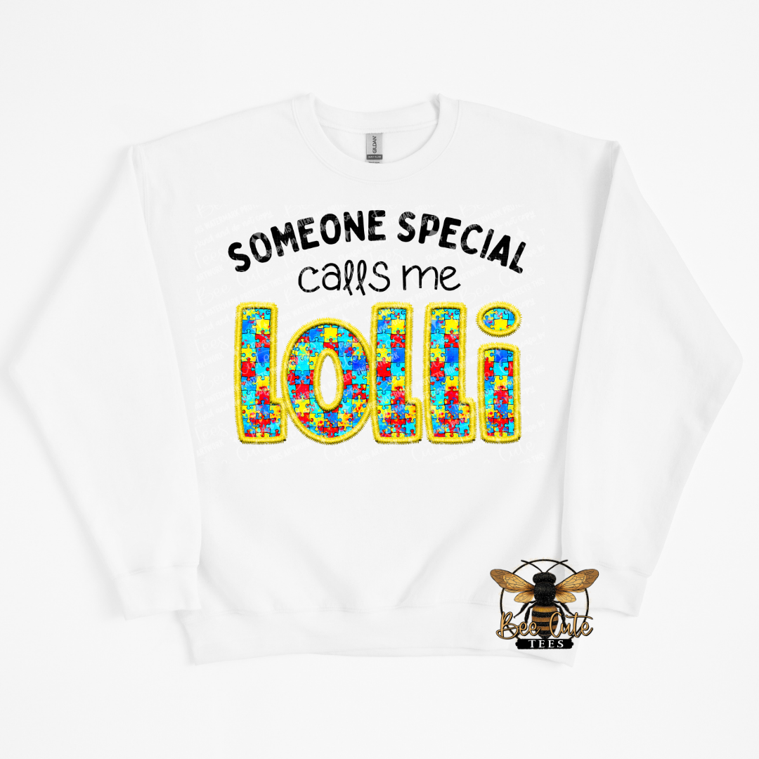 White sweatshirt with colorful text and a bee logo on a white background