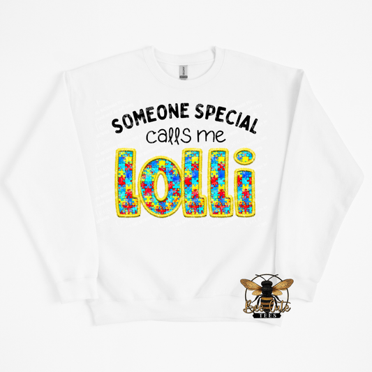 White sweatshirt with colorful text and a bee logo on a white background