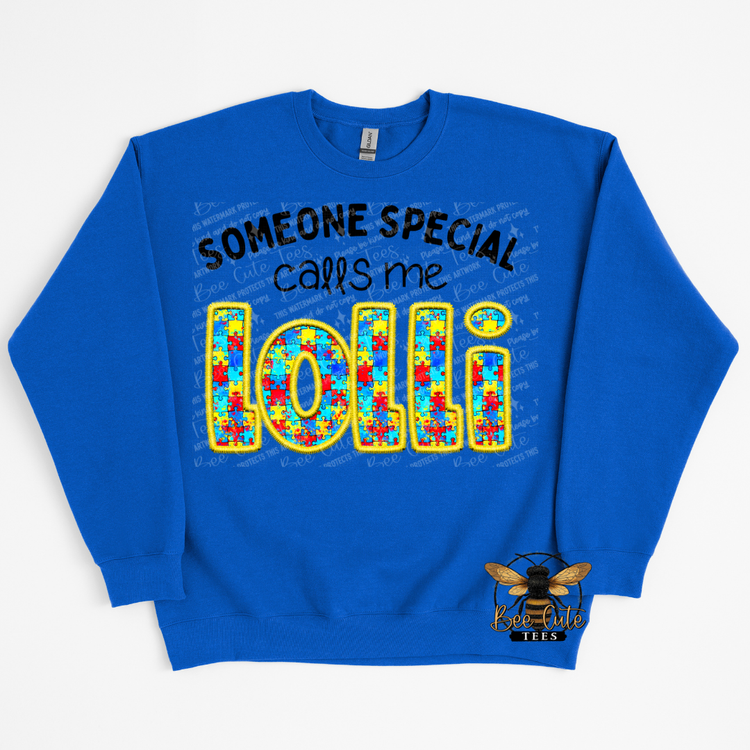 Blue sweatshirt with colorful text and a bee logo on a white background