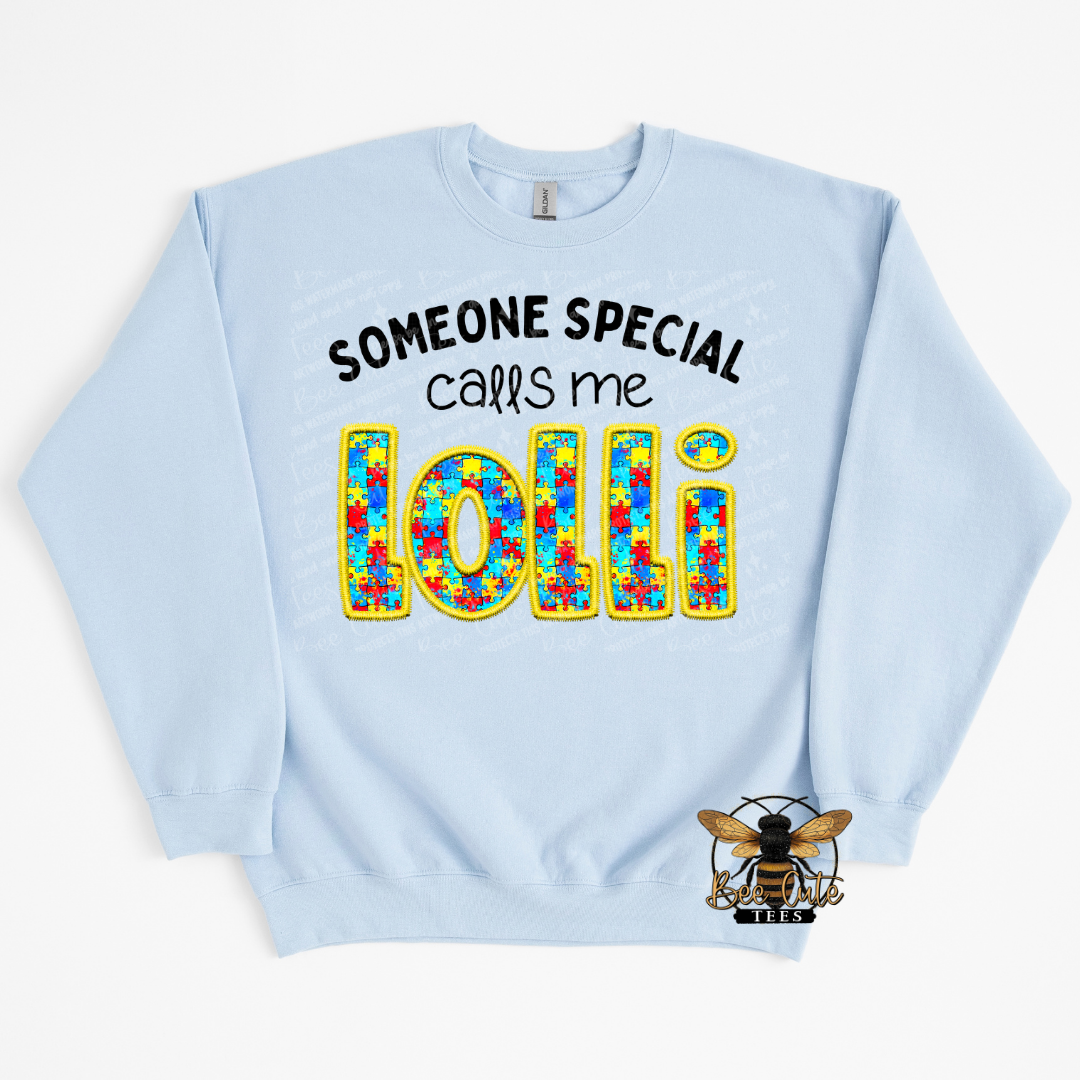 Light blue sweatshirt with colorful text and a logo on a white background