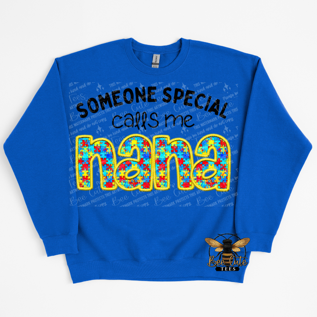 Blue sweatshirt with colorful text 'Someone special calls me nana' on a white background