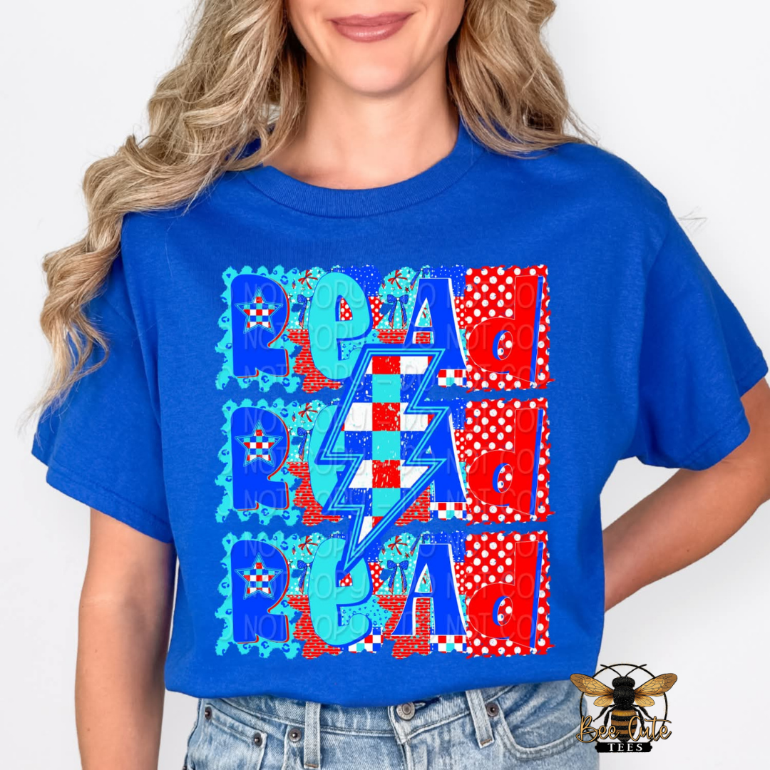 Person wearing a blue t-shirt with colorful text and patterns on a white background