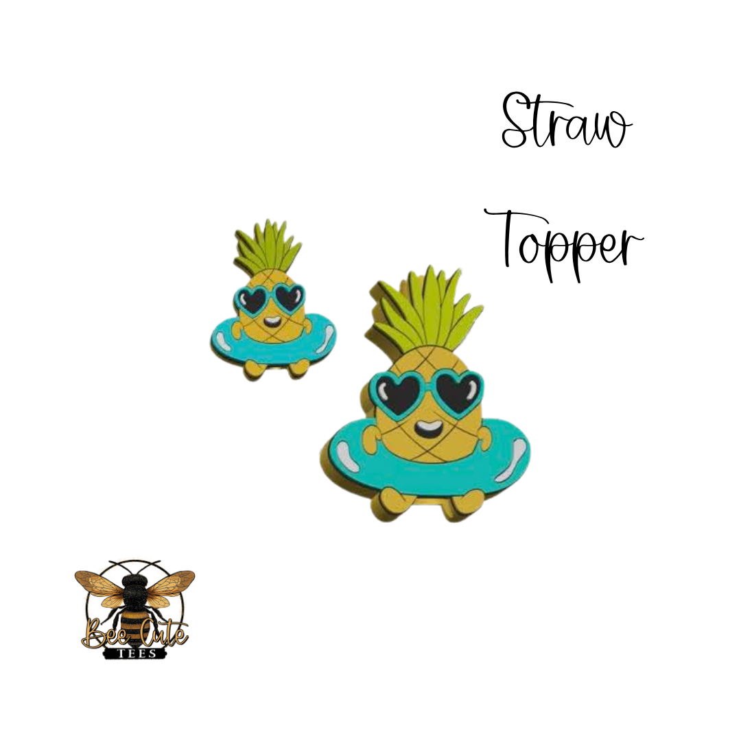 Pineapple straw topper with sunglasses and heart-shaped eyes on a white background.