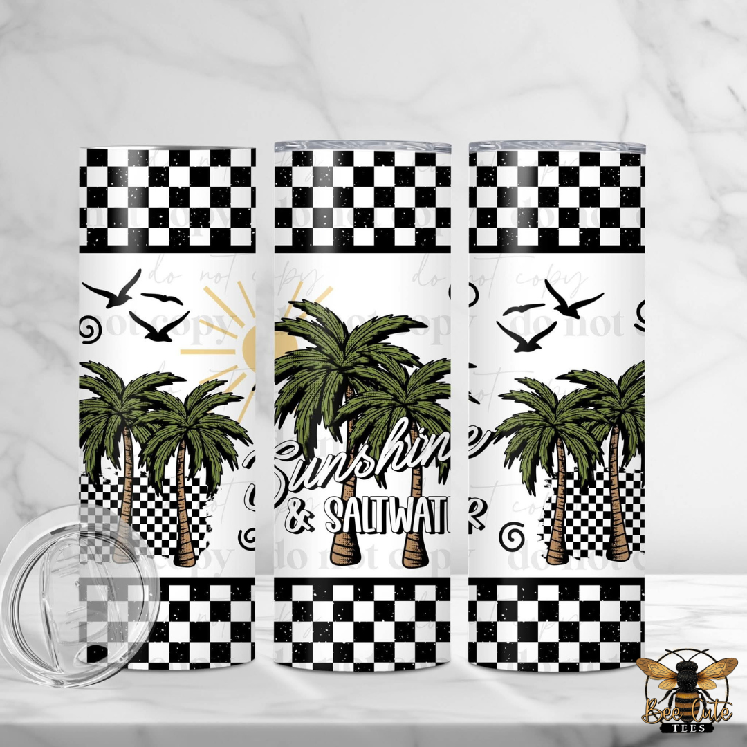 Set of three tumblers with palm tree and 'Sunshine & Saltwater' design on a white background