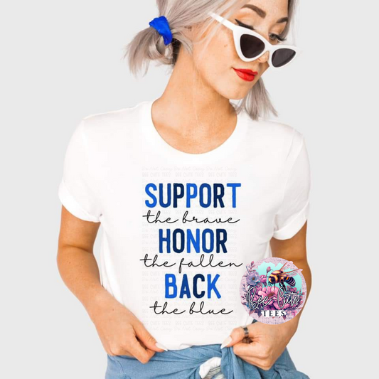 Person wearing a white t-shirt with text and holding a product with branding.