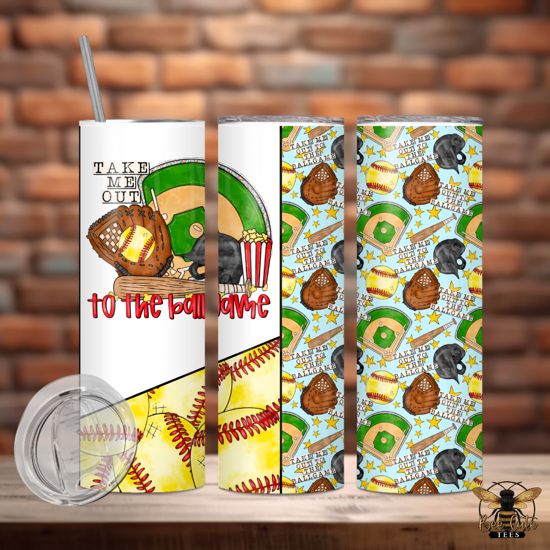 Tumbler with baseball-themed design on a wooden surface with a brick wall background