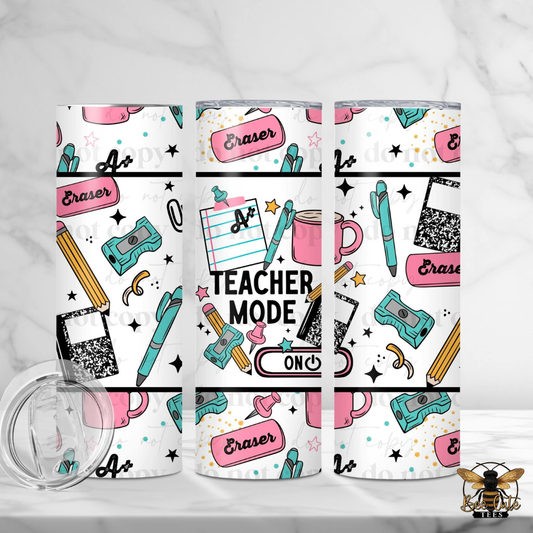 Three tumblers with teacher-themed designs on a white background