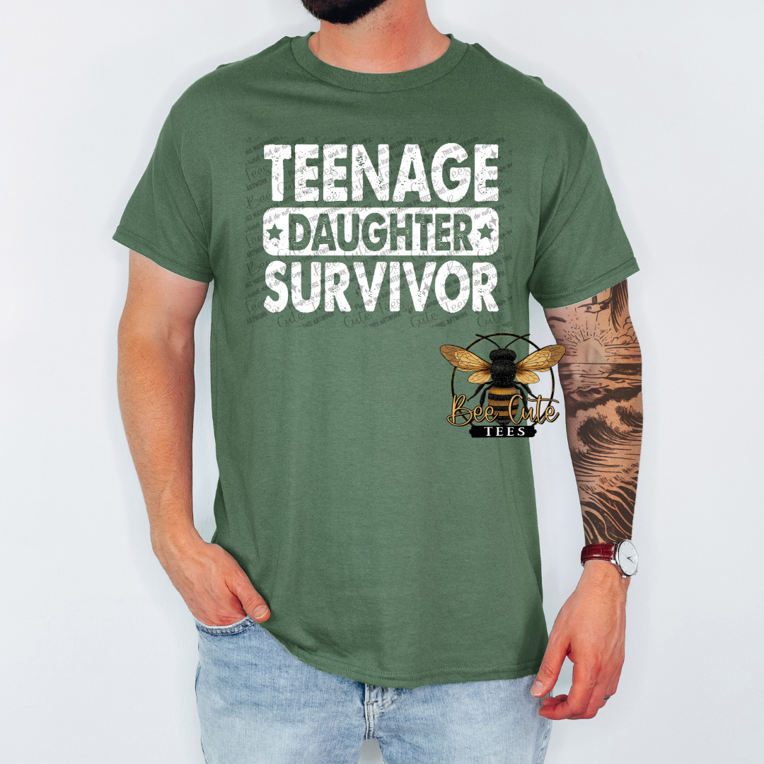 Person wearing a green t-shirt with 'Teenage Daughter Survivor' text and a bee logo.