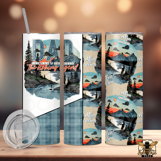 Tumbler with nature-themed design and 'Dad' text on a wooden surface.