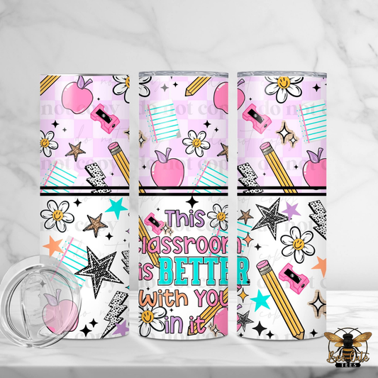 Three tumblers with educational-themed designs on a white background