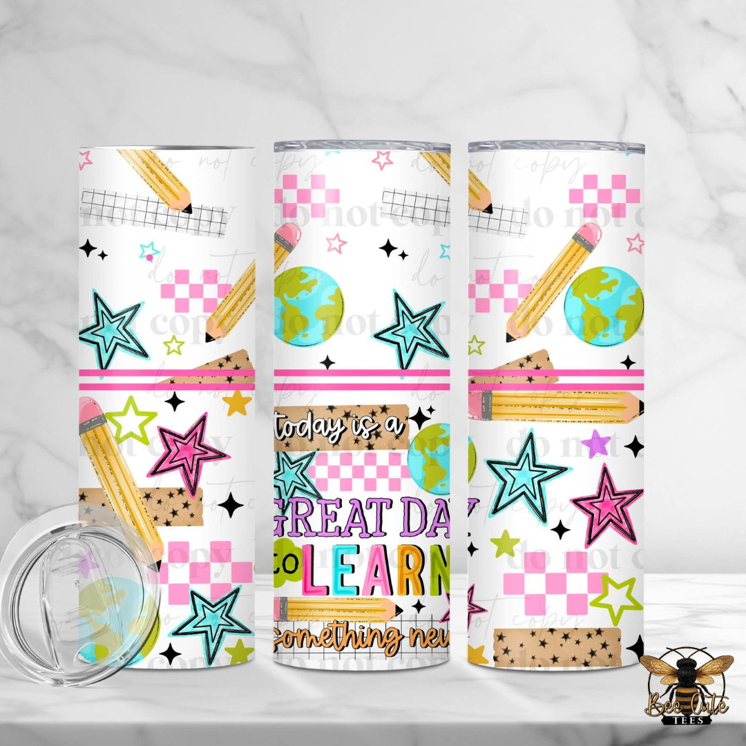 Three tumblers with educational-themed designs on a white background