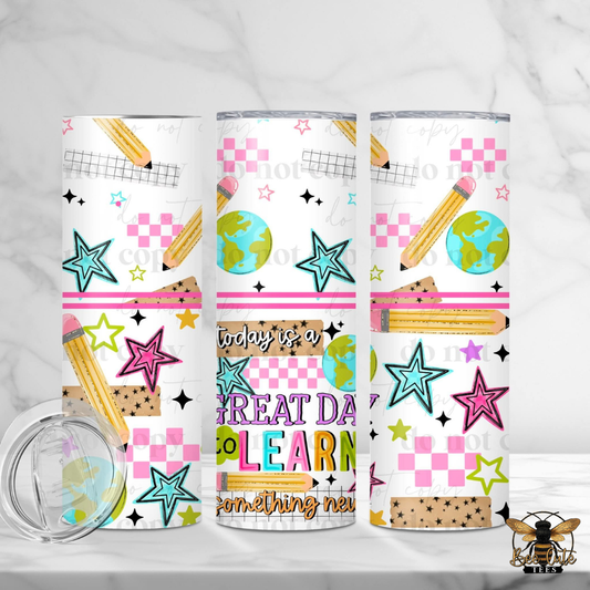 Three tumblers with educational-themed designs on a white background