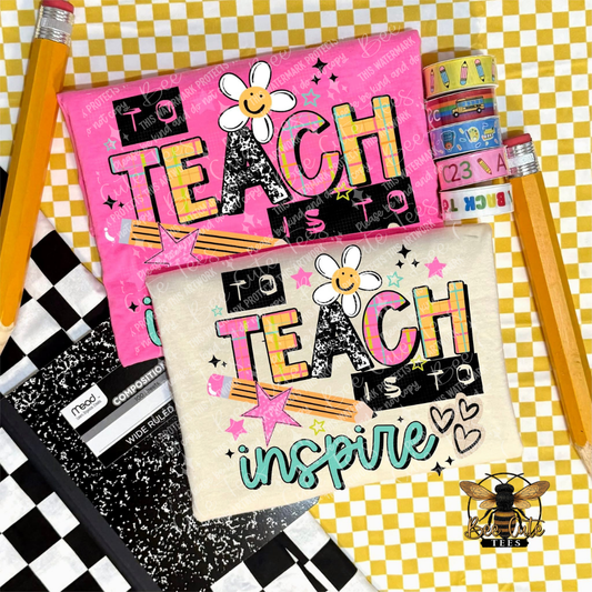 A styled flat-lay of two decorative notebooks with a pink and cream cover, each featuring the phrase 'to TEACH is to inspire' in colorful lettering, a smiling daisy, stars, and chalkboard-style text. Yellow pencils, washi tape, and a black-and-white checkered notebook are arranged around them on a yellow-and-white checkered background.