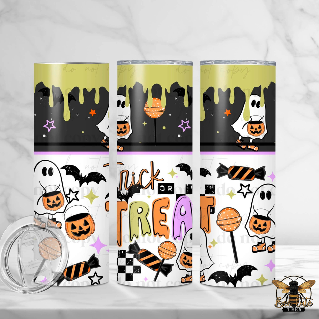 Three insulated tumblers with a Halloween-themed wrap design are displayed on a white marble surface. The design features a black top section with a gold dripping paint effect, a middle section with 'Trick or Treat' text, and a bottom section with ghosts, pumpkins, bats, and candy illustrations.