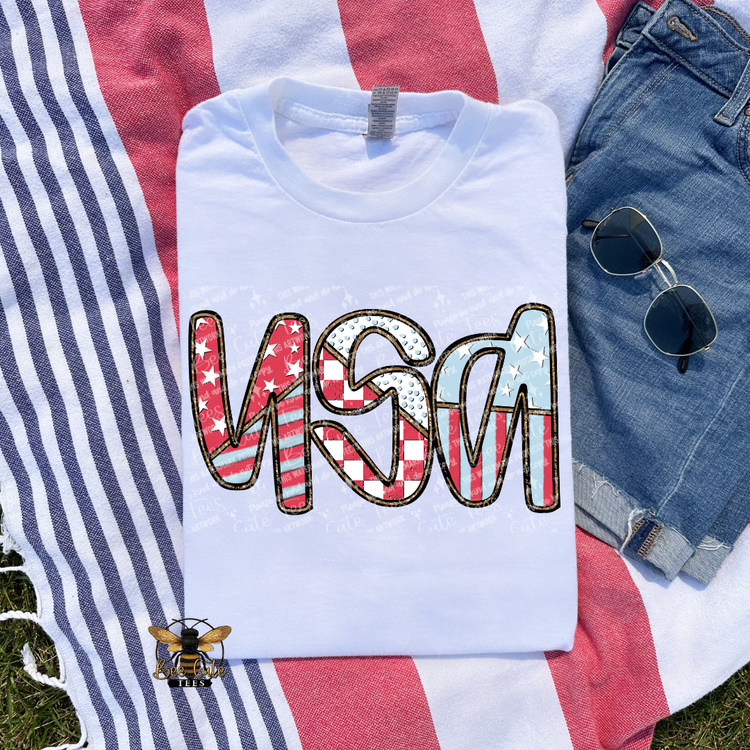 White t-shirt with 'USA' design on a flag background