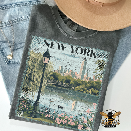 Gray sweatshirt with New York graphic design on a white background