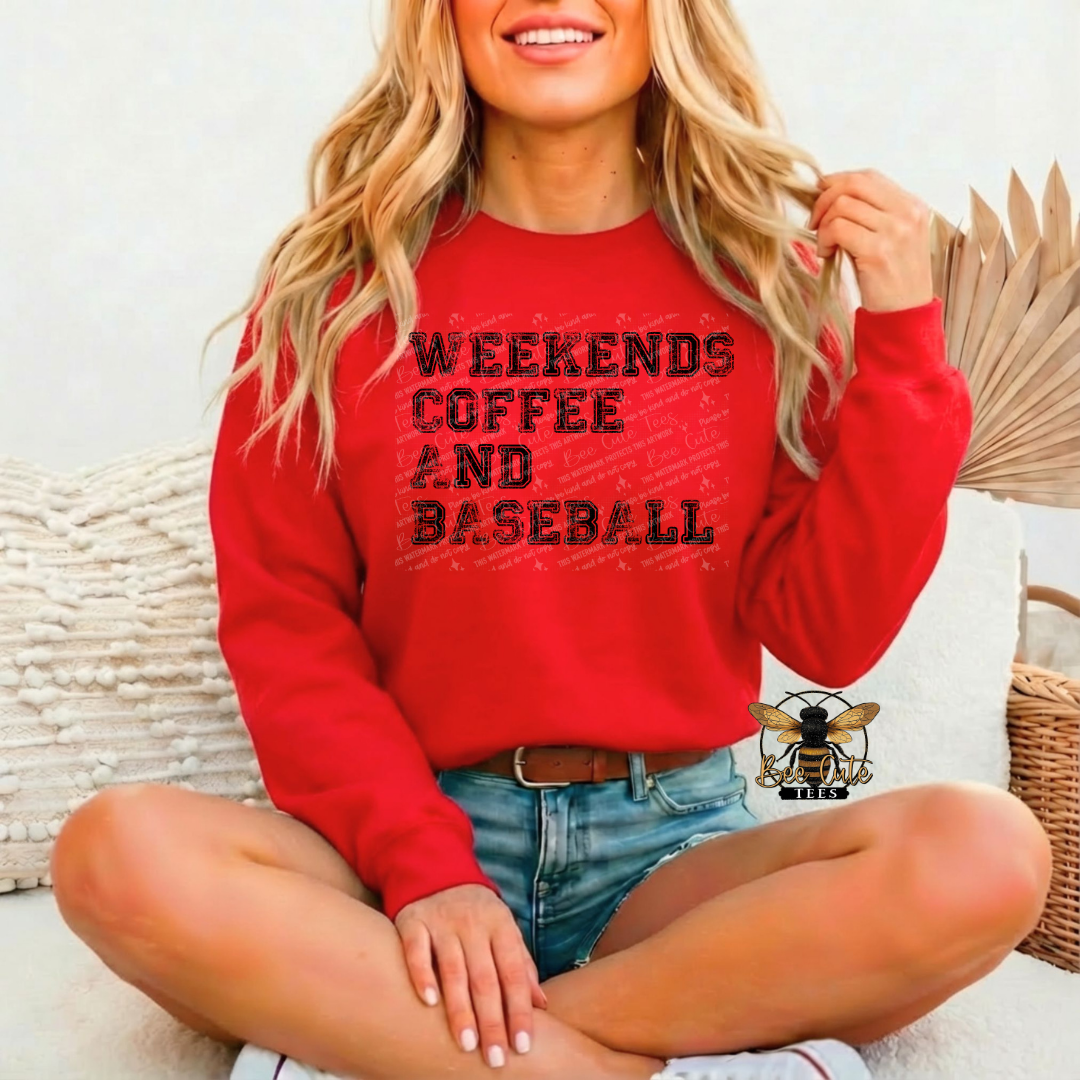 Woman wearing a red sweatshirt with 'Weekends Coffee and Baseball' text, sitting on a couch.