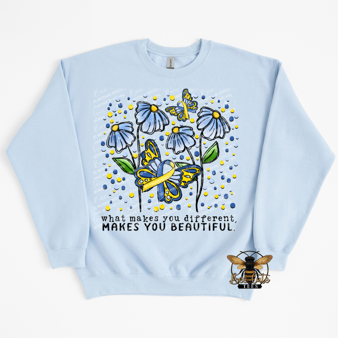 Light blue sweatshirt with butterfly and flower design and text on a white background