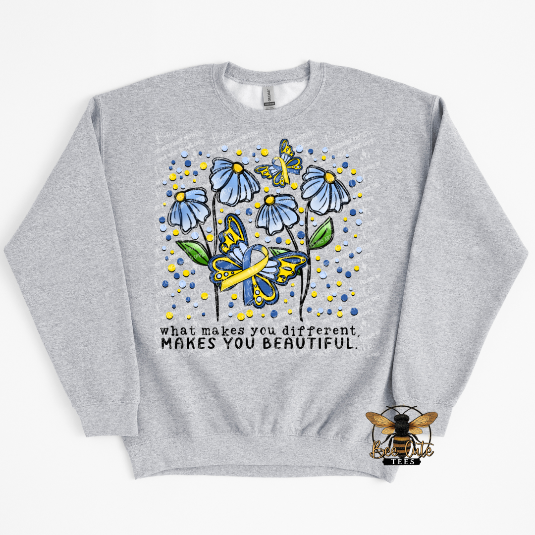 Gray sweatshirt with floral and butterfly design and motivational quote on a white background