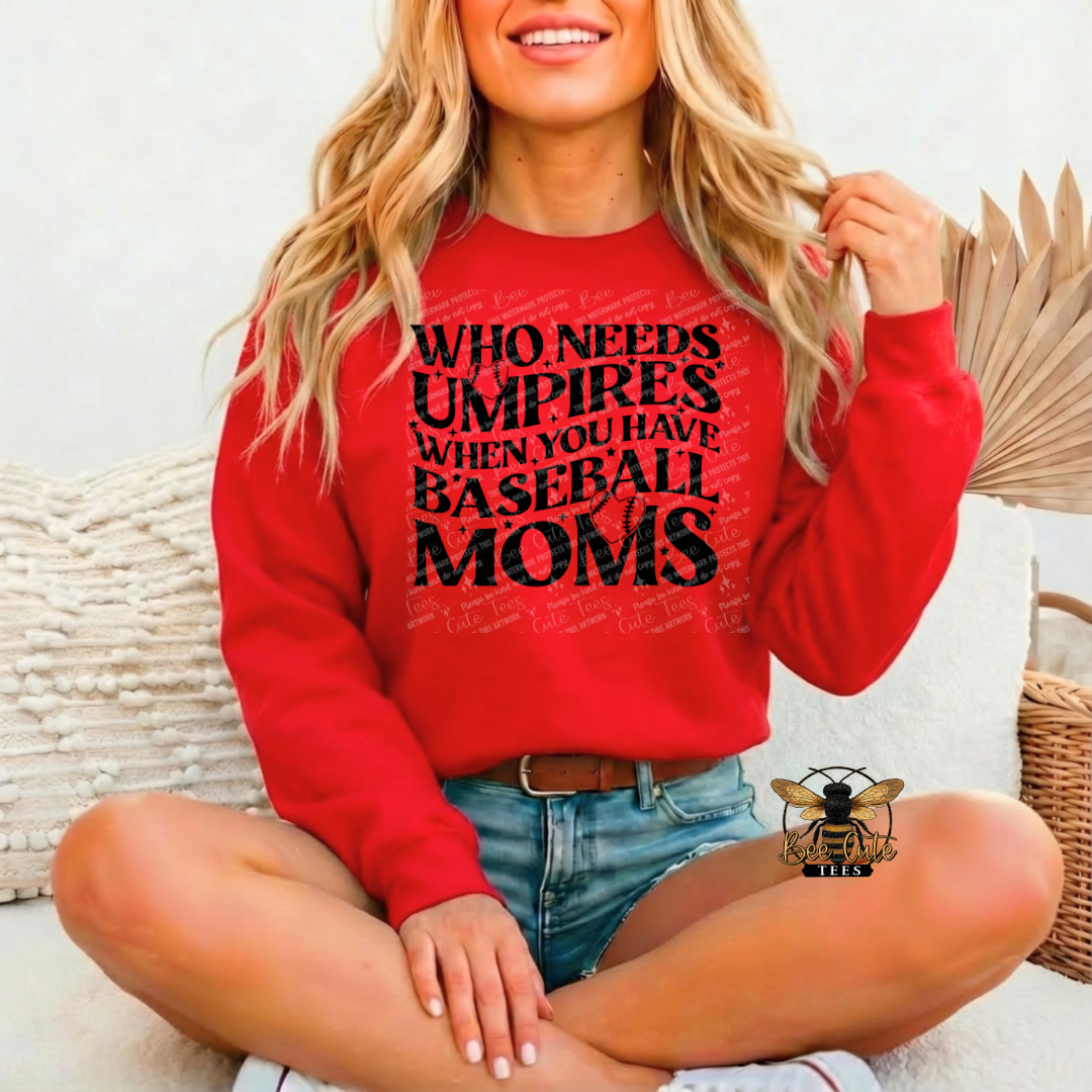 Woman wearing a red sweatshirt with text, sitting on a couch.