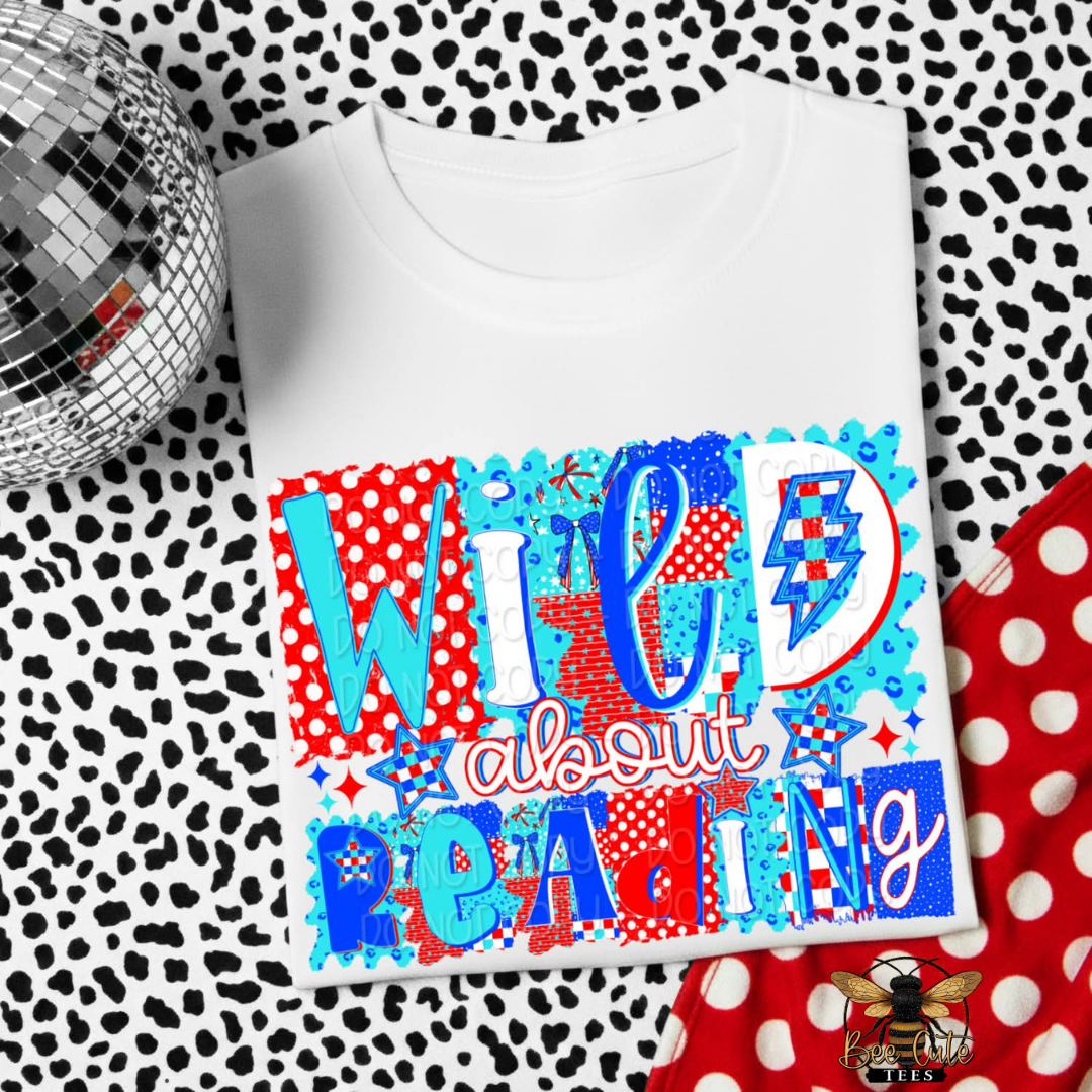 White t-shirt with colorful text design on a patterned background